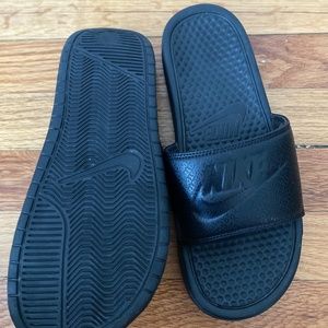 Black Nike slides